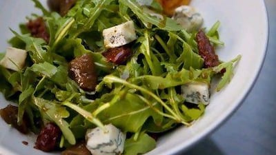 Arugula, gorgonzola, fig and walnut salad is a beauty of a summer dish.