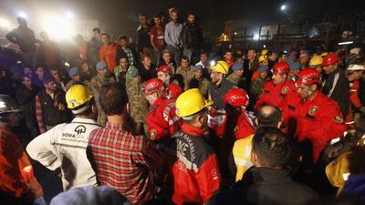 The body of a miner is carried to an ambulance in Soma, a district in Turkey's western province of Manisa May 14, 2014. An explosion and fire in the coal mine in Soma killed at least 151 miners and trapped hundreds more on Tuesday, with the death toll expected to rise in the country's worst mining accident for more than two decades. Energy Minister Taner Yildiz said 787 workers had been in the mine in Soma, around 120 km (75 miles) northeast of the Aegean coastal city of Izmir, when the blast occurred. REUTERS/Osman Orsal (TURKEY - Tags: DISASTER ENERGY)
