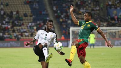 Thomas Partey of Ghana, left. Gavin Barker / EPA