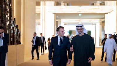 Sheikh Khaled bin Mohamed with Emmanuel Macron. Mohamed Raeisi for the UAE Presidential Court