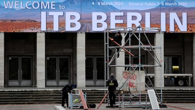 Workers make preparations for the upcoming International Tourism Trade Fair ITB as officials consider cancelling the fair for the spread of the coronavirus in the country in Berlin, Germany. REUTERS