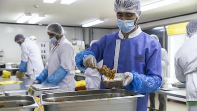 Chefs at Modern Bakery in Al Quoz, Dubai prepare Ramadan iftar meals for Dar Al Ber Society, a licensed charity. Antonie Robertson / The National
