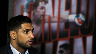 Amir Khan during the press conference. Andrew Couldridge / Reuters