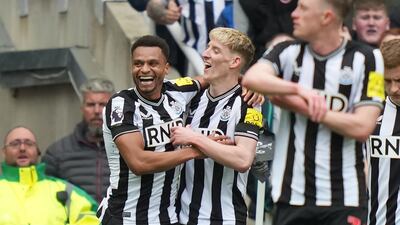 Newcastle United's Anthony Gordon, centre, celebrates with teammates after scoring their second goal. AFP