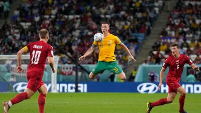 Australia's Mitchell Duke chests the ball. AP