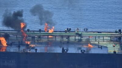 Flames and smoke rise from the Greek-flagged oil tanker Sounion in the Red Sea. US military sources say the vessel appears to be leaking. Reuters
