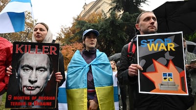 Protesters rally to condemn Russian strikes on Ukraine during an event organised by Russian emigrants and activists, in Tbilisi, south-east Georgia, on November 26, 2022. AFP