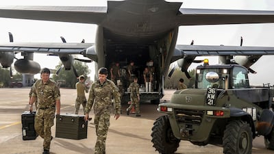 Military personnel unload stores during the evacuation of British citizens in Sudan. Photo: MoD
