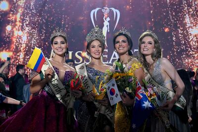 From left, Miss Colombia Andrea Aguilera, Miss Korea Mina Sue Choi, Miss Palestine Nadeen Ayoub and Miss Australia Sheridan Mortlock after the coronation night of the Miss Earth pageant in Manila on November 29, 2022. AFP