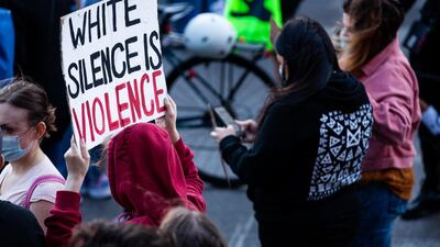 A protester's sign at a march in support of Black Lives Matter on June 14, Chicago, Illinois. Natasha Moustache/Getty Images/AFP