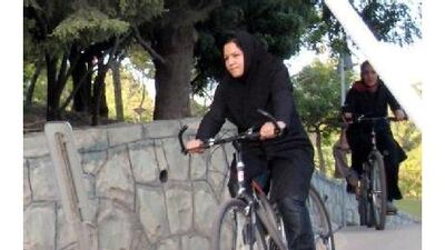 Iranian women ride their bicycles at Tehran's "Mothers' Paradise" park, which is the Iranian capital's women-only public recreation area.
