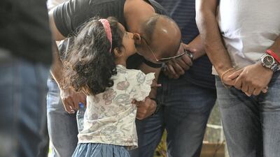 People attend the multi-religious observances at the Sri Lankan Embassy.