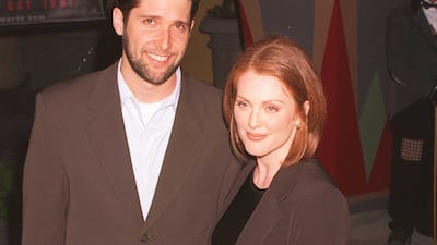 Julianne Moore, in a brown suit, attends a screening of 'Lost World' in Los Angeles, California, on May 20, 1997. Getty Images