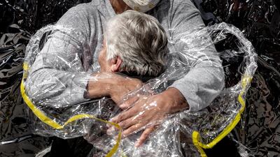 Rosa Luzia Lunardi (85) is embraced by nurse Adriana Silva da Costa Souza, at Viva Bem care home, São Paulo, Brazil, on 5 August 2020. Mads Nissen