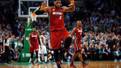 Miami Heat's LeBron James celebrates after scoring a late winner against Boston.