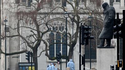 British police officers work at the scene of the attack at the Houses of Parliament in London on March 23, 2017. Jack Taylor / Getty Images