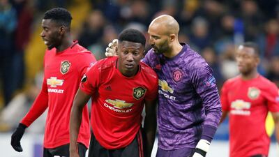 Manchester United's Lee Grant consoles Di'Shon Bernard at the Astana Arena. Reuters
