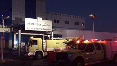 In this handout image uploaded on the official Twitter account of the directorate of the Saudi Civil Defense agency, firefighters gather outside the Jazan General Hospital after a blaze broke out in the intensive care unit and the maternity departmen on December 24. AFP Photo