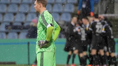 Bayern Munich's Manuel Neuer after Holstein Kiel's Hauke Wahl scored their second goal. Reuters