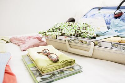 If you’re travelling with others, consider putting half of your stuff into their bag and vice versa. Getty