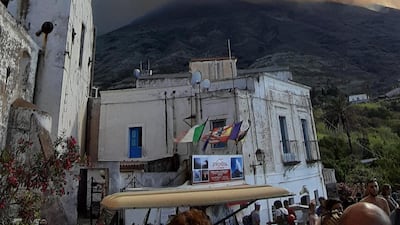 Ash rises into the sky after a volcano eruption on a small island of Stromboli, Italy. According to reports, the island of Stromboli was hit by a set of violent volcano eruptions spurring beach tourists to take into the sea. Two new lava spouts are creeping down the volcano. EPA