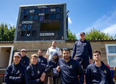Former UAE cricketer Adnan Mufti with some of the Clevedon team members. Mark Thomas for The National