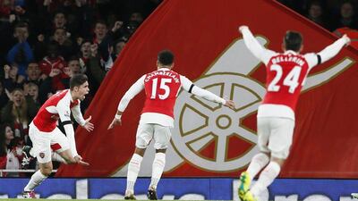 Arsenal’s Gabriel Paulista celebrates after scoring against Bournemouth for his team’s opening goal. Stefan Wermuth / Reuters