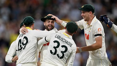 Australia's Josh Inglis celebrates running out England captain Ben Stokes. Getty Images