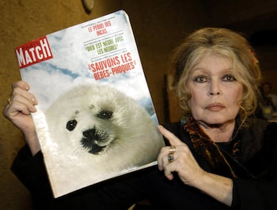 Former French actress Brigitte Bardot displays a 1969 copy of French magazine Paris Match showing a seal on the cover in 2005. Reuters