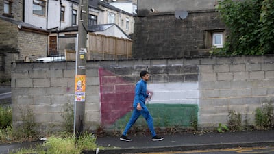 The Palestinian national flag is painted on a wall in Keighley, an English town with a sizeable Muslim population. AFP