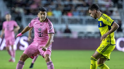 Inter Miami forward Luis Suarez in action against Nashville's Daniel Lovitz. EPA