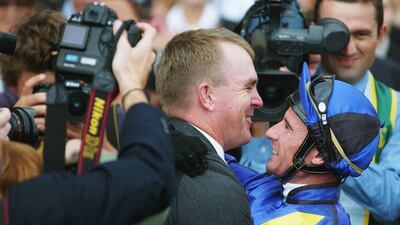 Australian horse trainer John O’Shea, centre, shown here with jockey Glen Boss, is the new trainer to the Darley Australia string. Jon Buckle / Getty Images