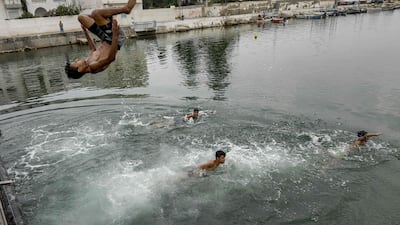 The public are flocking to cool in off in the water.