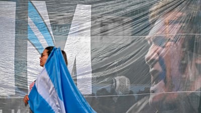 A banner depicting Argentina's president-elect Javier Milei in Buenos Aires. AFP