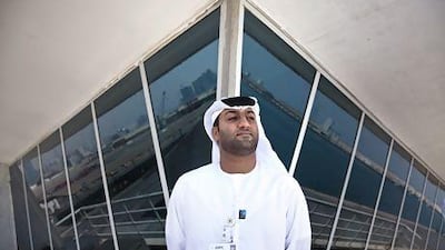 Captain Jaber Al Shehhi overlooks the Mina Zayed port in Abu Dhabi of which he is the manager. Silvia Razgova / The National