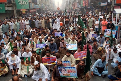 Supporters of Islamic political party Tehrik Labaik Ya RasoolAllah (TLP) protest after the Supreme Court acquitted Asia Bibi, a Christian accused of blasphemy, in Faisalabad,EPA/ILYAS SHEIKH