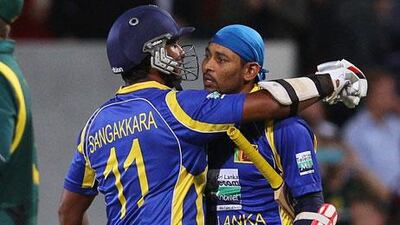 Tillakaratne Dilshan, right, was involved in a 55-run partnership with Kumar Sangakkara on Tuesday.