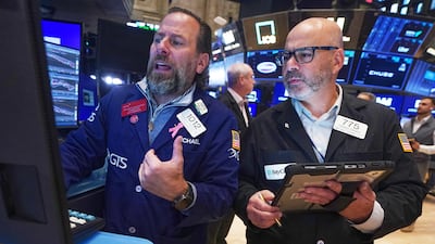 Traders on the floor of the New York Stock Exchange. AP