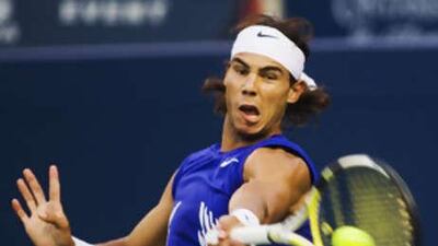 Rafael Nadal returns a shot to Andy Murray during their semi-final match at the Rogers Cup tennis tournament in Toronto.