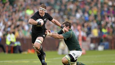 New Zealand's Kieran Read tries to run through the tackle by Willem Alberts from South Africa in the All Blacks 38-27 win to clinch the Rugby Championship. AFP