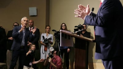 Miami-based Univision anchor Jorge Ramos asks Republican presidential candidate Donald Trump a question about his immigration proposal during a news conference in Dubuque, Iowa. Ramos was later removed from the room. Charlie Neibergall / AP Photo