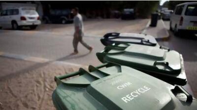 Thousands of villas across Abu Dhabi were given green and black bins to separate recycables and rubbish. Residents of high-rise buildings are now keen to get similar eco-friendly waste-disposal options. Silvia Razgova / The National