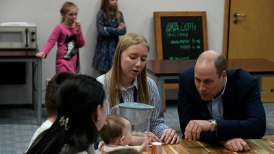 The Prince of Wales visits an accommodation centre in Warsaw. AP