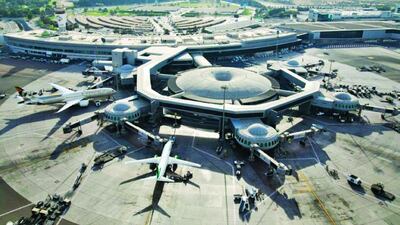 Abu Dhabi International Airport, known as AUH, pictured from above. The airport opened in 1982 after the emirate outgrew the smaller Al Bateen Airport. Wam
