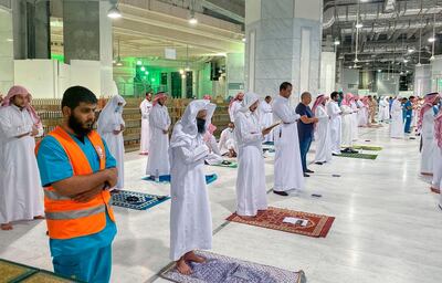 Muslim worshippers perform the "Tarawih" nightly prayer during the holy month of Ramadan, while keeping their distance amid the COVID-19 pandemic in Mecca. AFP