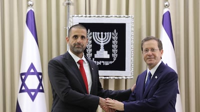 Khaled Yousef Al Jalahma, left, the first ambassador of Bahrain to Israel with the country's President Isaac Herzog. EPA
