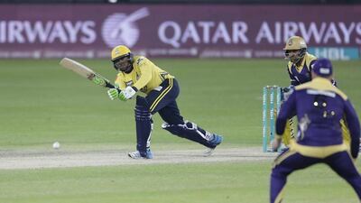 Shahid Yousaf ( Peshawar Zalmi ) bats against Quetta Gladiators at their ongoing HBL Pakistan Super League cricket tournament, held at the Dubai International Cricket Stadium. ( Jeffrey E Biteng / The National )