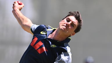Australia's Pat Cummins bowls in the nets during a training session in Perth, Australia. AP