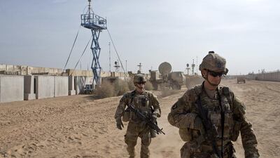 US military soldiers move through Qayyarah West coalition base in Qayyarah, some 50 kilometres south of Mosul, Iraq on November 9, 2016. Now that Donald Trump will be the next US president, all eyes are on his policies on ISIL and the Middle East. Marko Drobnjakovic/AP Photo