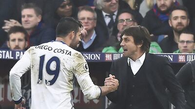 Chelsea's Diego Costa, left, celebrates with manager Antonio Conte, right, against Crystal Palace on December 17, 2016. Hannah McKay / EPA